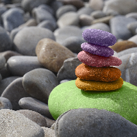  Colored rocks stacked one on another